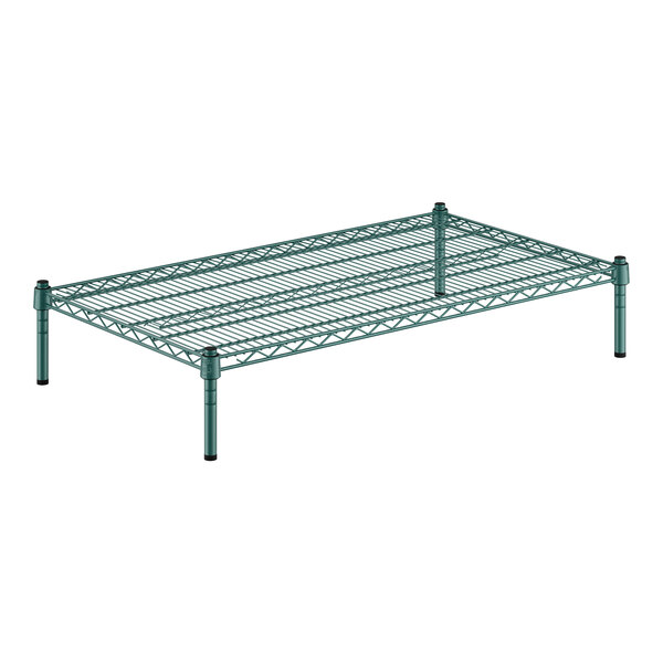 A green wire shelf with green legs.