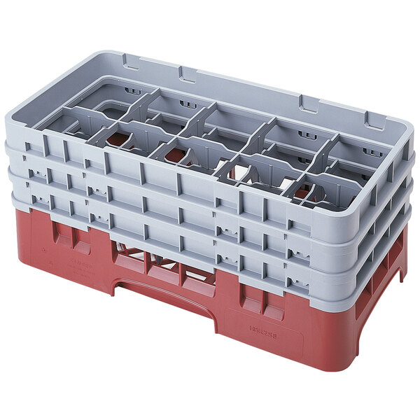 A cranberry and gray plastic Cambro half size glass rack with 10 compartments.