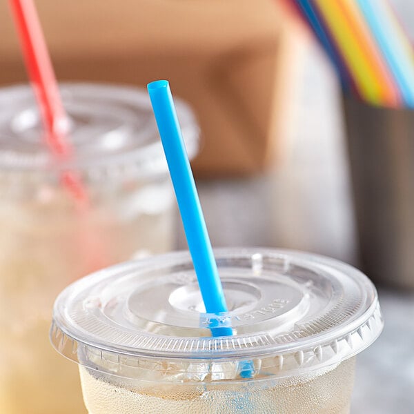 A plastic cup with a blue Choice jumbo soda straw in it.