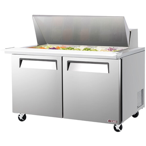 A Turbo Air E-line stainless steel 2 door mega top refrigerated salad prep table on a counter.