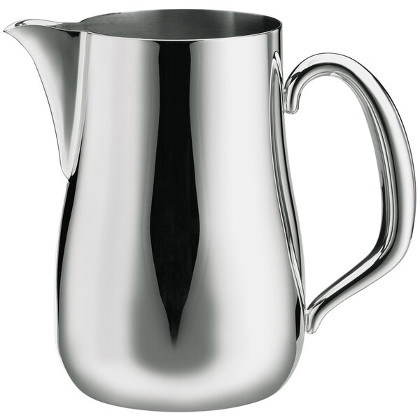 A Walco brushed stainless steel pitcher with a handle.