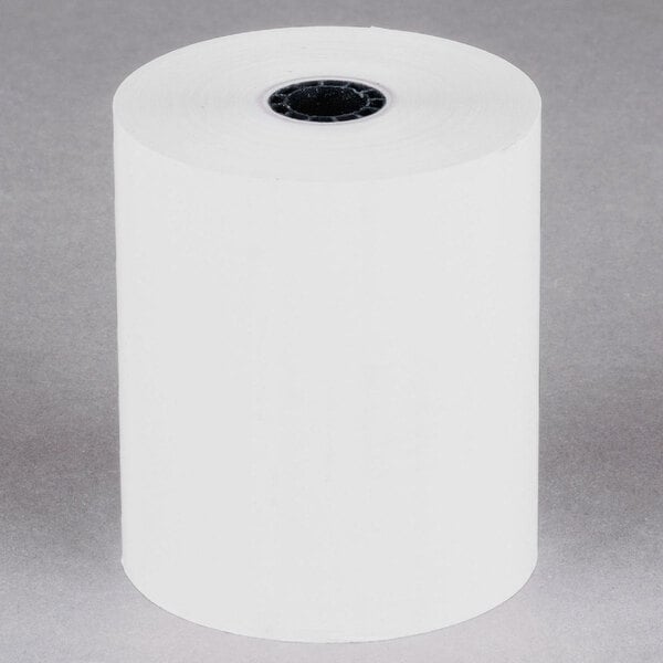 A white roll of Point Plus thermal cash register paper with a black core.