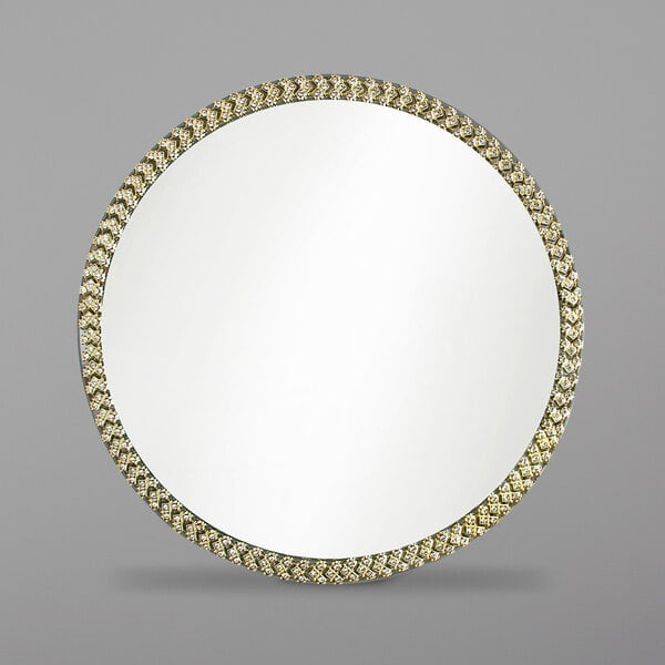 A round mirror with a silver border.