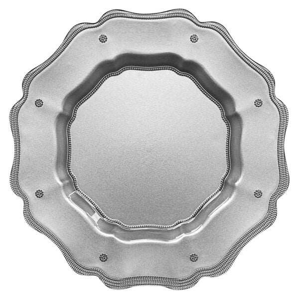 A silver Mariloo glass charger plate with a scalloped edge.
