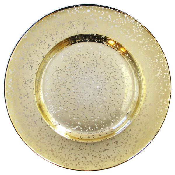 A Charge It by Jay gold glass charger plate with a speckled rim.