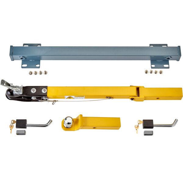 A yellow rectangular metal tow hitch kit with a white label.