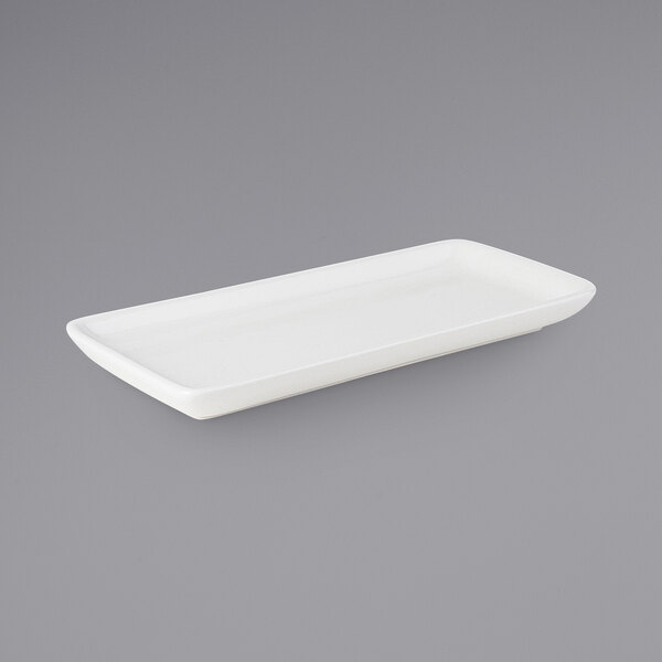 A white rectangular Tuxton China tray with a silver handle.