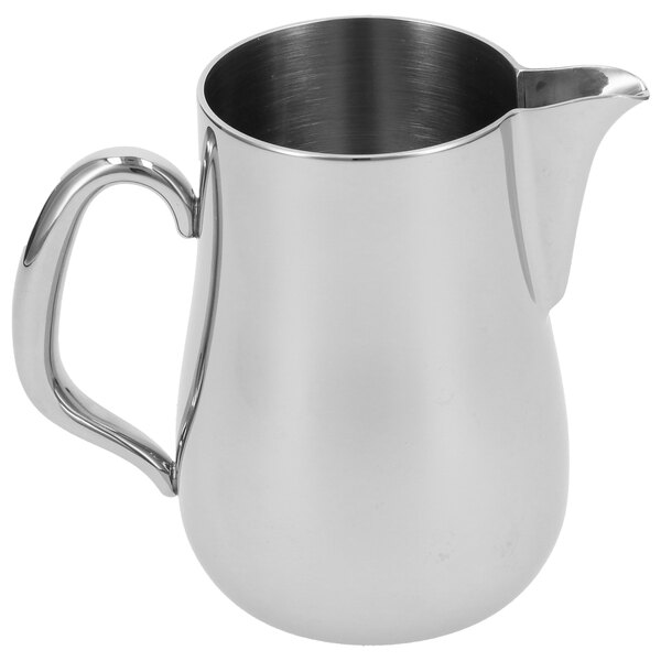 A silver stainless steel Walco Soprano creamer with a handle.