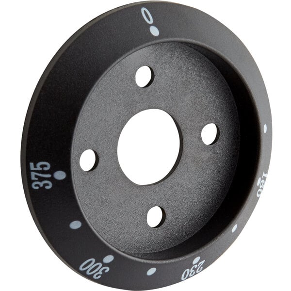 A black circular Galaxy temperature knob collar with white numbers and holes.