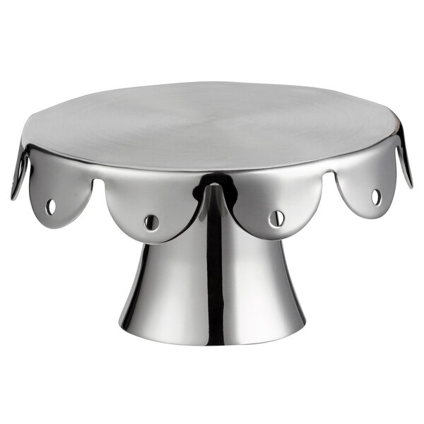 A silver Vollrath mini round cake stand with scalloped edges.