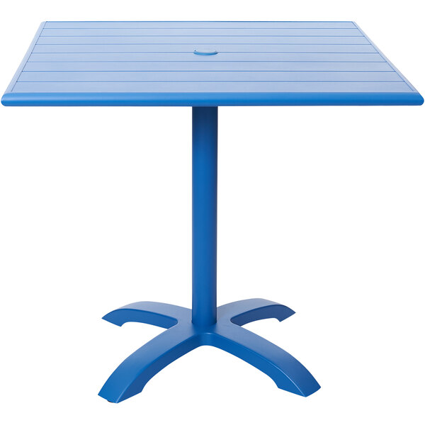 A blue square Beachcomber Bali table with a metal base.