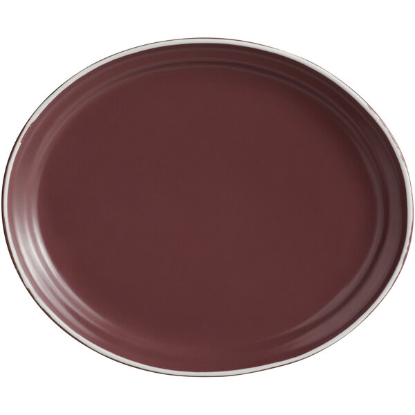 A matte mulberry oval platter with a white border.