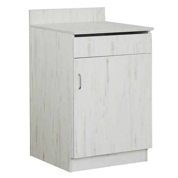 A white cabinet with a door.