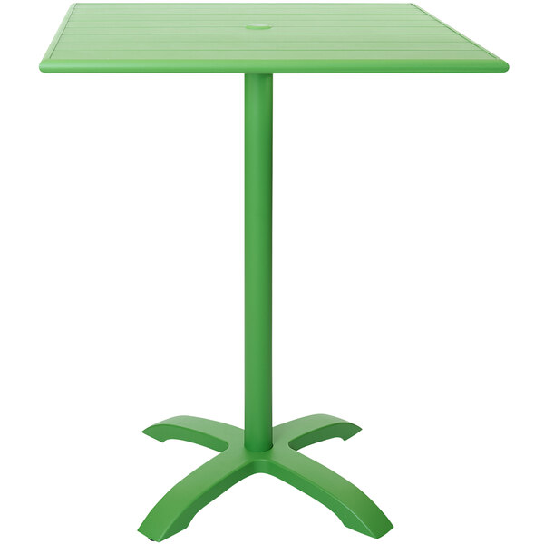 A lime green square table with a metal base.