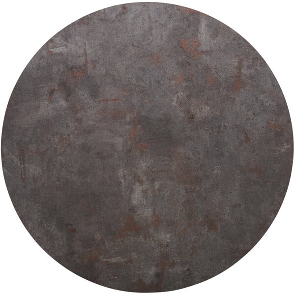A BFM Seating round melamine table top with a rustic grey surface and matching edge.
