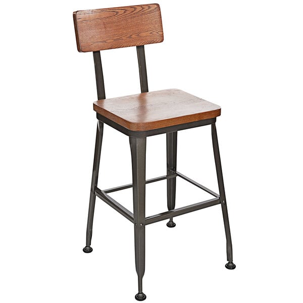 A BFM Seating Lincoln wood and metal counter height stool with a wooden seat and back.