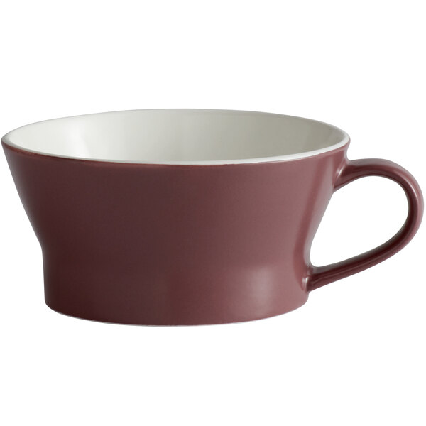 A matte mulberry porcelain soup mug with a white rim and a brown handle.