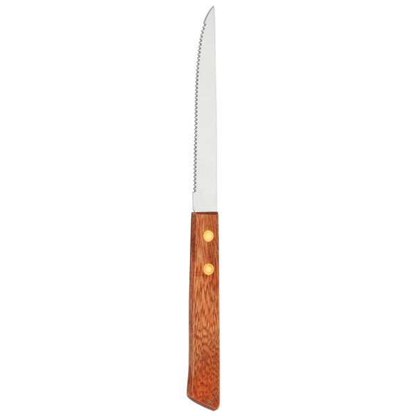 A Walco stainless steel serrated steak knife with a wooden handle.