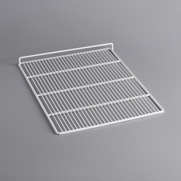 A white metal grid on a gray surface.