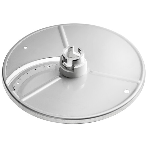 A white circular metal slicing disc with a hole and a metal screw.