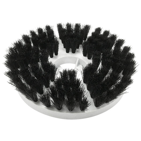 A circular black MotorScrubber delicate cleaning brush.