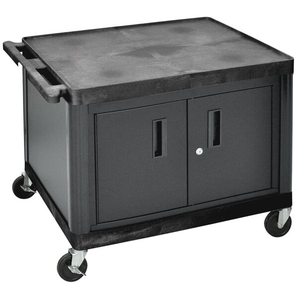A black Luxor A/V cart with locking cabinet and wheels.