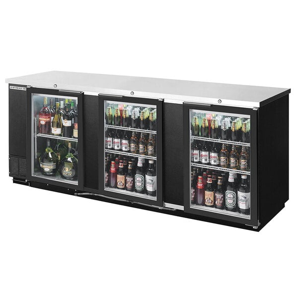 A black Beverage-Air back bar wine refrigerator with drinks in it.