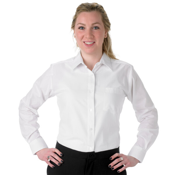 A woman wearing a Henry Segal white dress shirt.