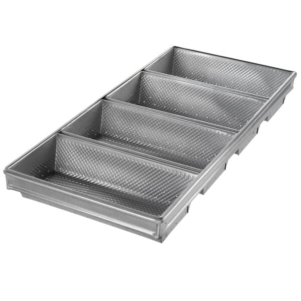 A Chicago Metallic aluminized steel bread pan with four compartments.