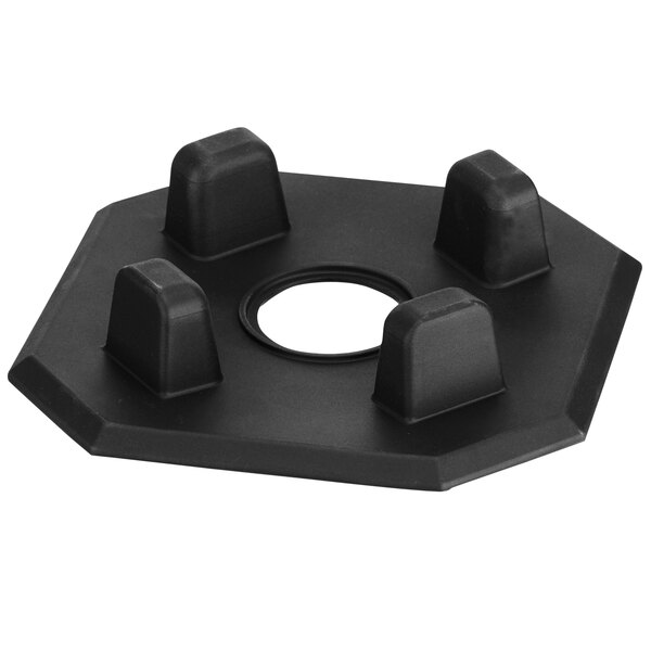 A black plastic Waring jar pad with four holes.