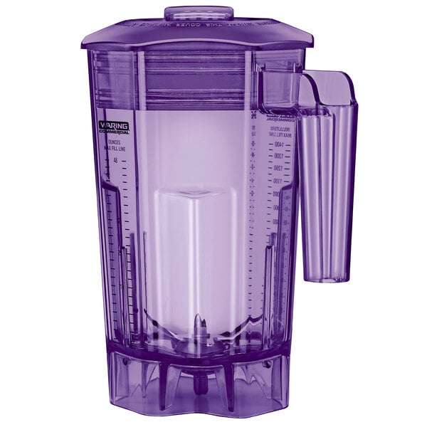 A purple plastic blender container with a white liquid inside.
