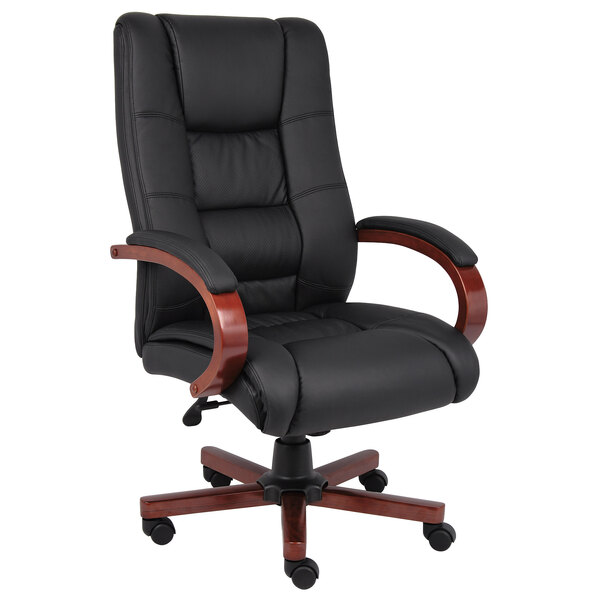 A black office chair with wooden arms.