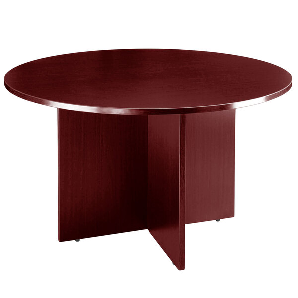 A Boss mahogany laminate round office table.
