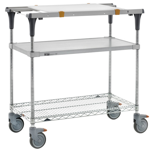A Metro PrepMate MultiStation cart with wire shelving and wheels.