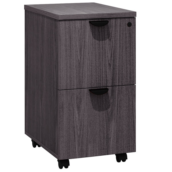 A Boss Driftwood laminate mobile pedestal letter file cabinet with 2 file drawers and wheels.