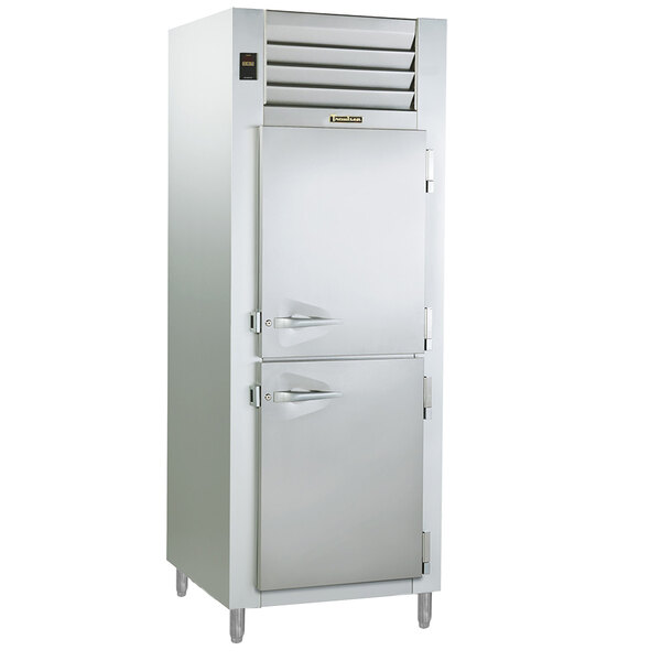 A Traulsen stainless steel refrigerator/freezer with half doors.