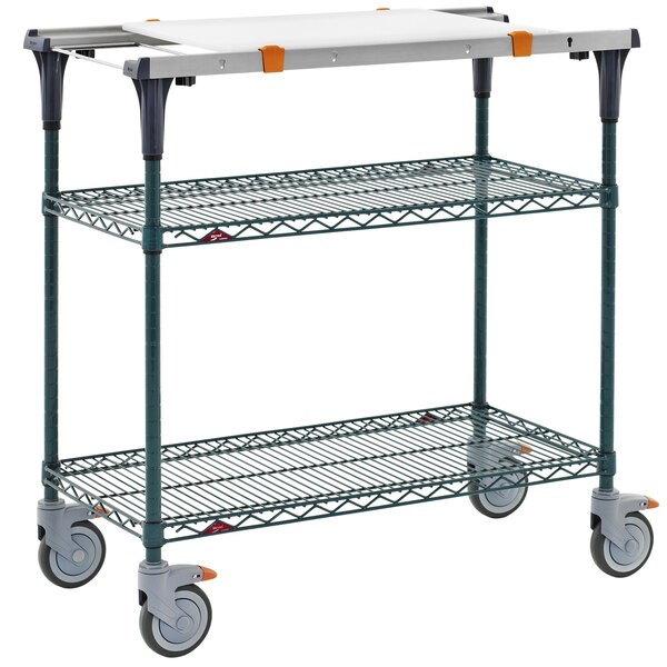 A Metro PrepMate MultiStation cart with wheels and a white surface.