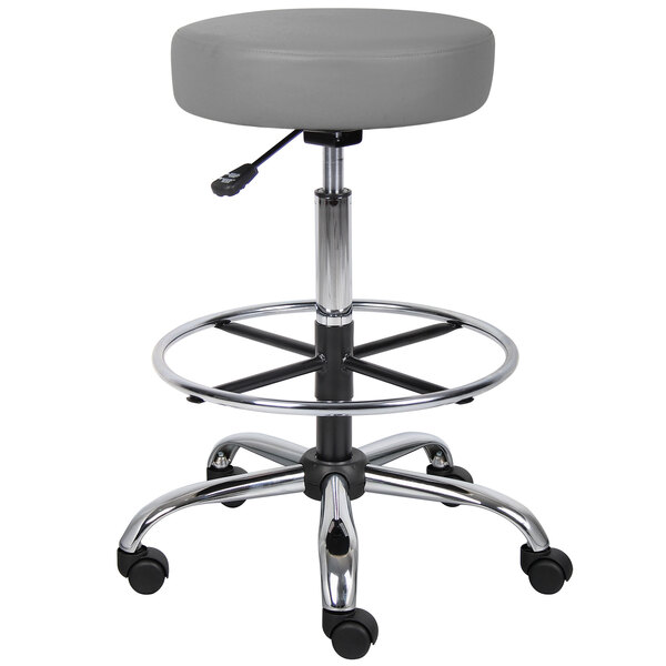 A Boss gray vinyl drafting stool with wheels.