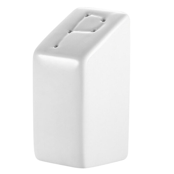 A bright white square porcelain pepper shaker with a hole in the top.