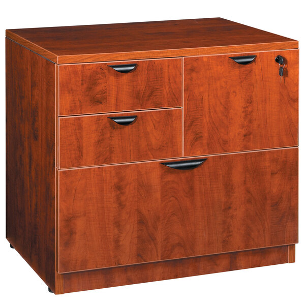 A cherry laminate Boss combination lateral file cabinet with three drawers.