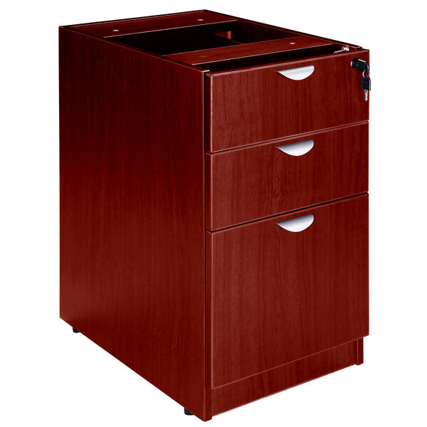 A mahogany laminate Boss pedestal letter file cabinet with 2 box drawers and 1 file drawer.