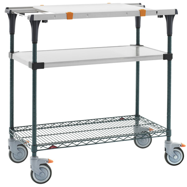 A Metro PrepMate MultiStation cart with a metal shelf and wheels.