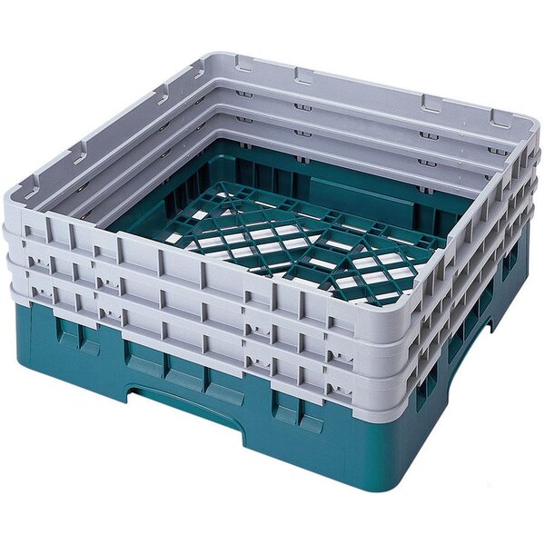 A teal Cambro Camrack with closed sides and extenders holding plastic containers.