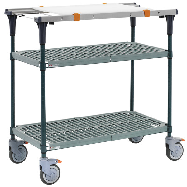 A grey three tiered Metro PrepMate cart with wheels.