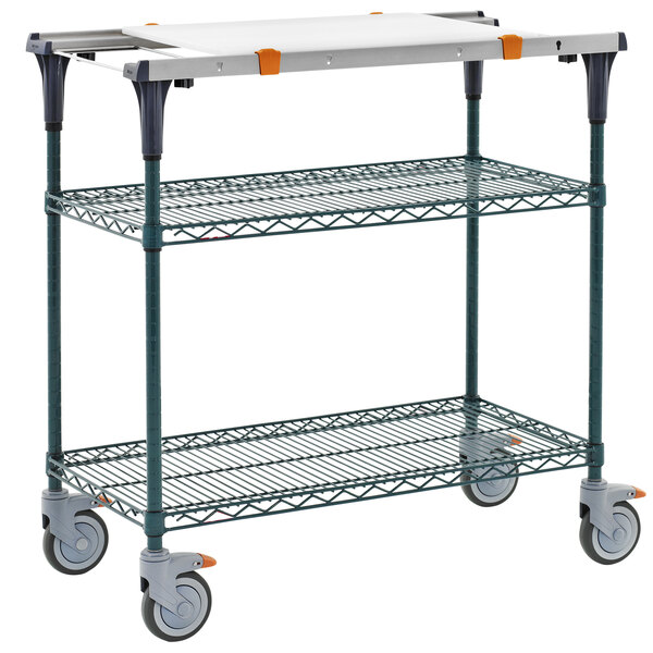 A Metro metal cart with wheels and a white surface.