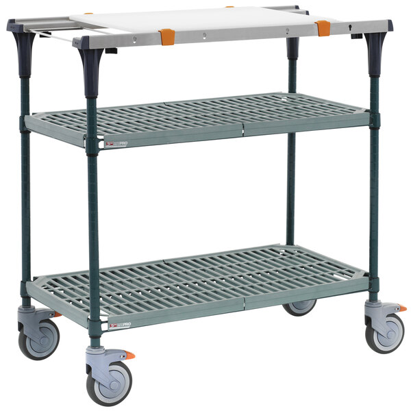 A Metro PrepMate MultiStation, a three tiered metal cart with wheels and a shelf.