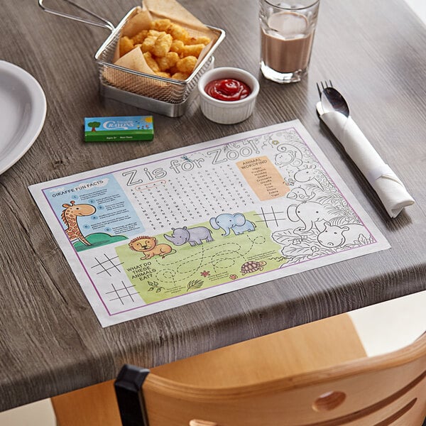 A table with a white plate of food and a Choice Kids Zoo Themed Interactive Placemat.
