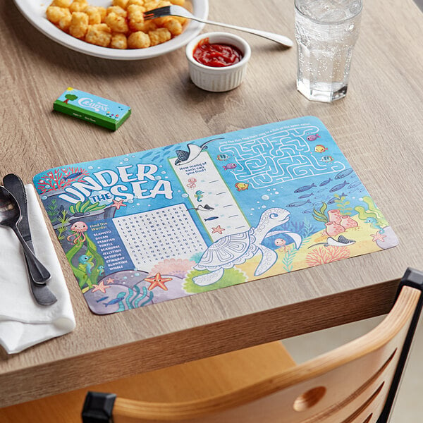 A Choice kids under the sea themed placemat on a table.