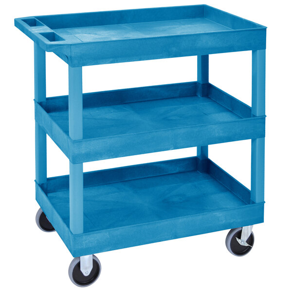 A blue Luxor utility cart with three shelves and wheels.