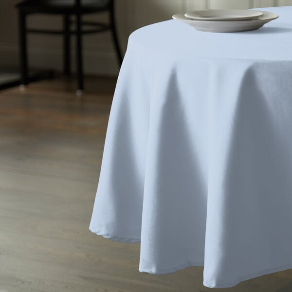 Intedge 90" Round Light Blue 100% Polyester Hemmed Cloth Table Cover